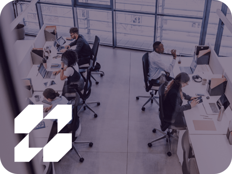Office workers with devices